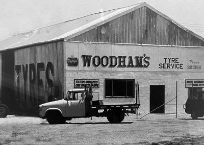 Historic Image of Woodhams tyre service shed black and white